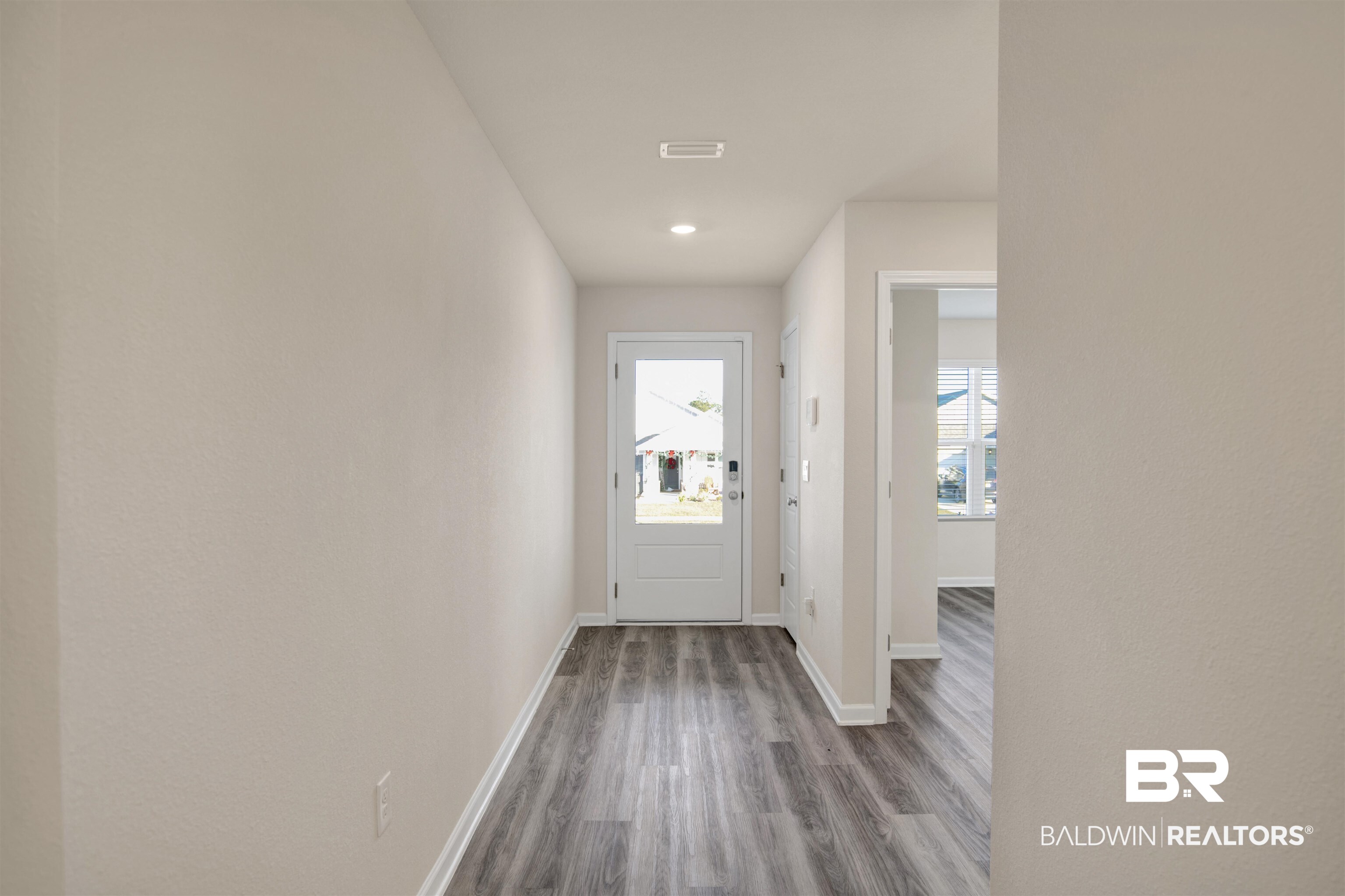 32038 Lyon Road Daphne, AL 36527 - Photo 10 of 30 Entryway featuring wood finished floors and recessed lighting