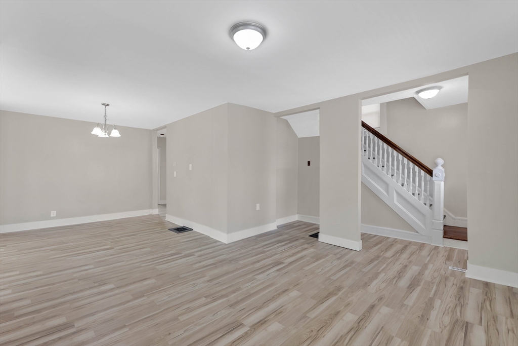 171 Boston Road Springfield, MA 01109 - Photo 15 of 33 a view of an empty room with wooden floor
