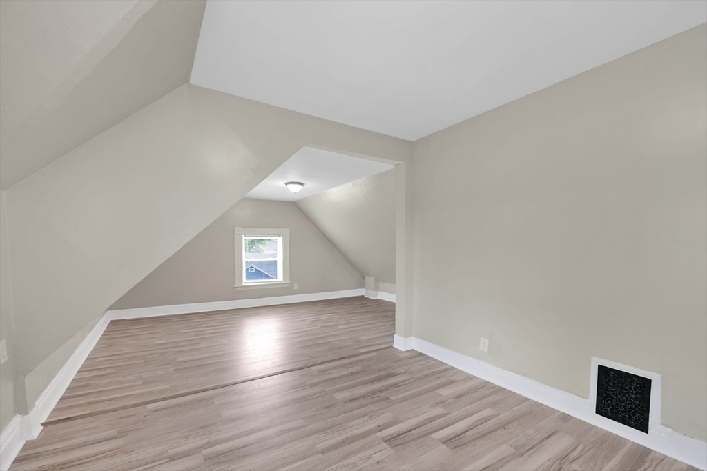 171 Boston Road Springfield, MA 01109 - Photo 29 of 33 a view of an empty room with wooden floor