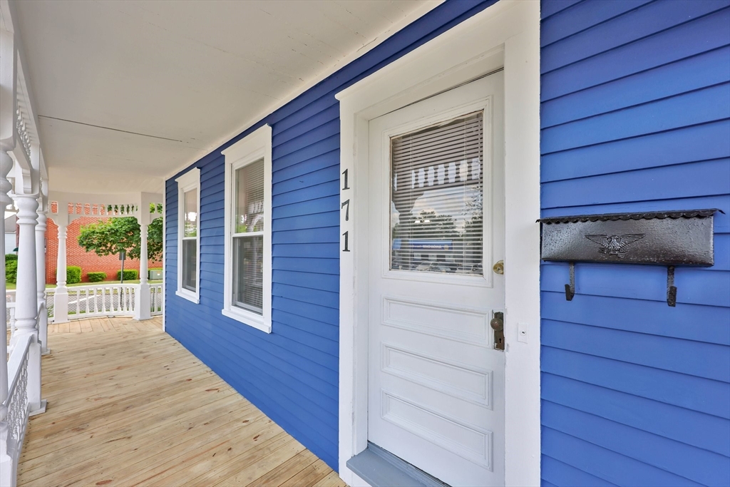 171 Boston Road Springfield, MA 01109 - Photo 3 of 33 a view of front door deck and living room