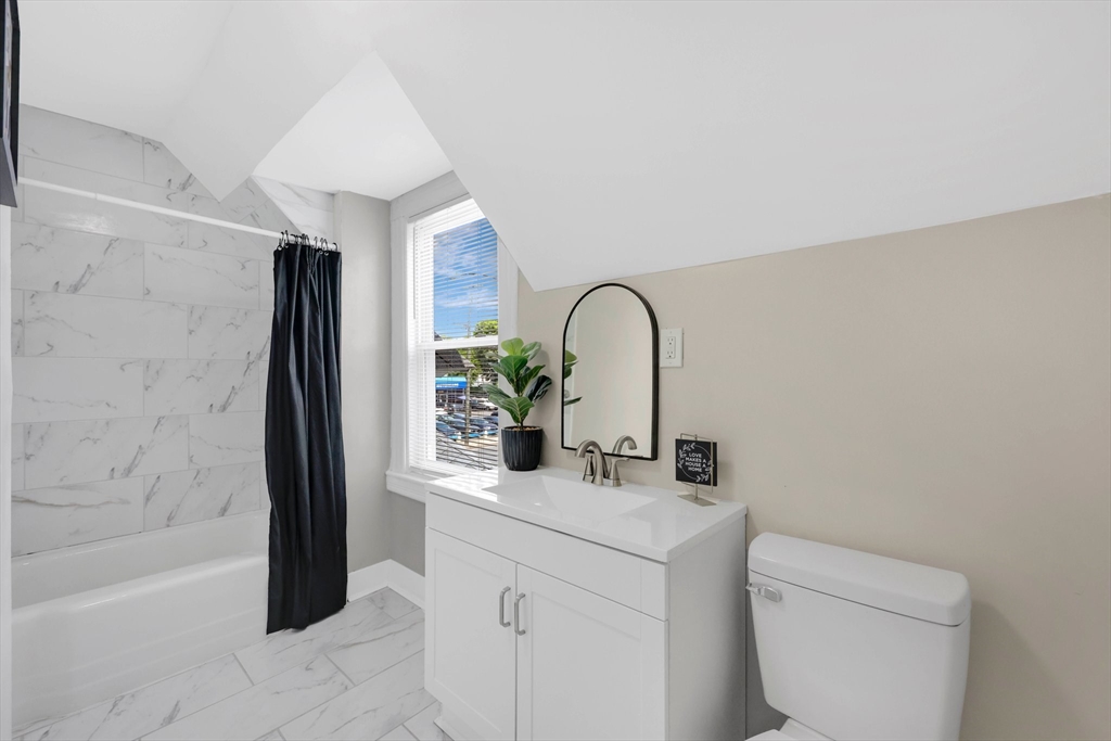 171 Boston Road Springfield, MA 01109 - Photo 32 of 33 a bathroom with a sink a toilet and shower