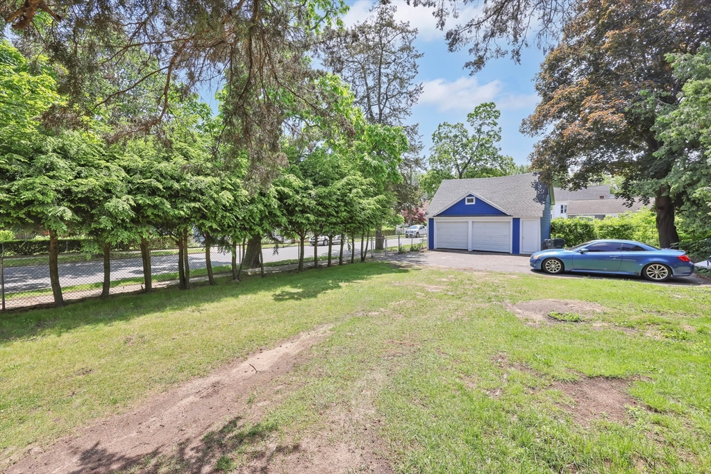 171 Boston Road Springfield, MA 01109 - Photo 7 of 33 a view of a house with a yard and tree s