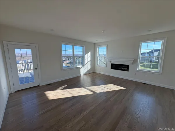 an empty room with windows