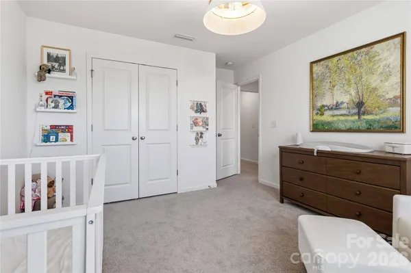 a room with furniture and a window