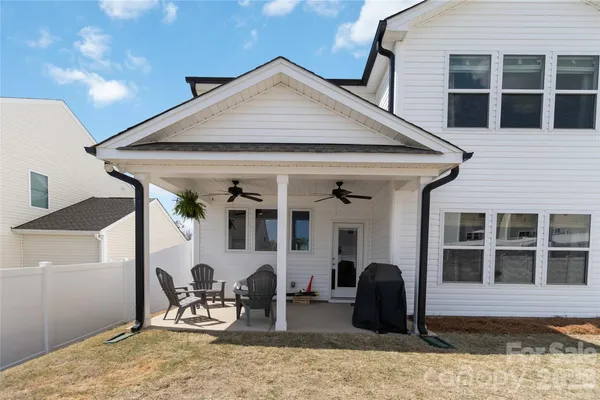 a front view of a house with patio