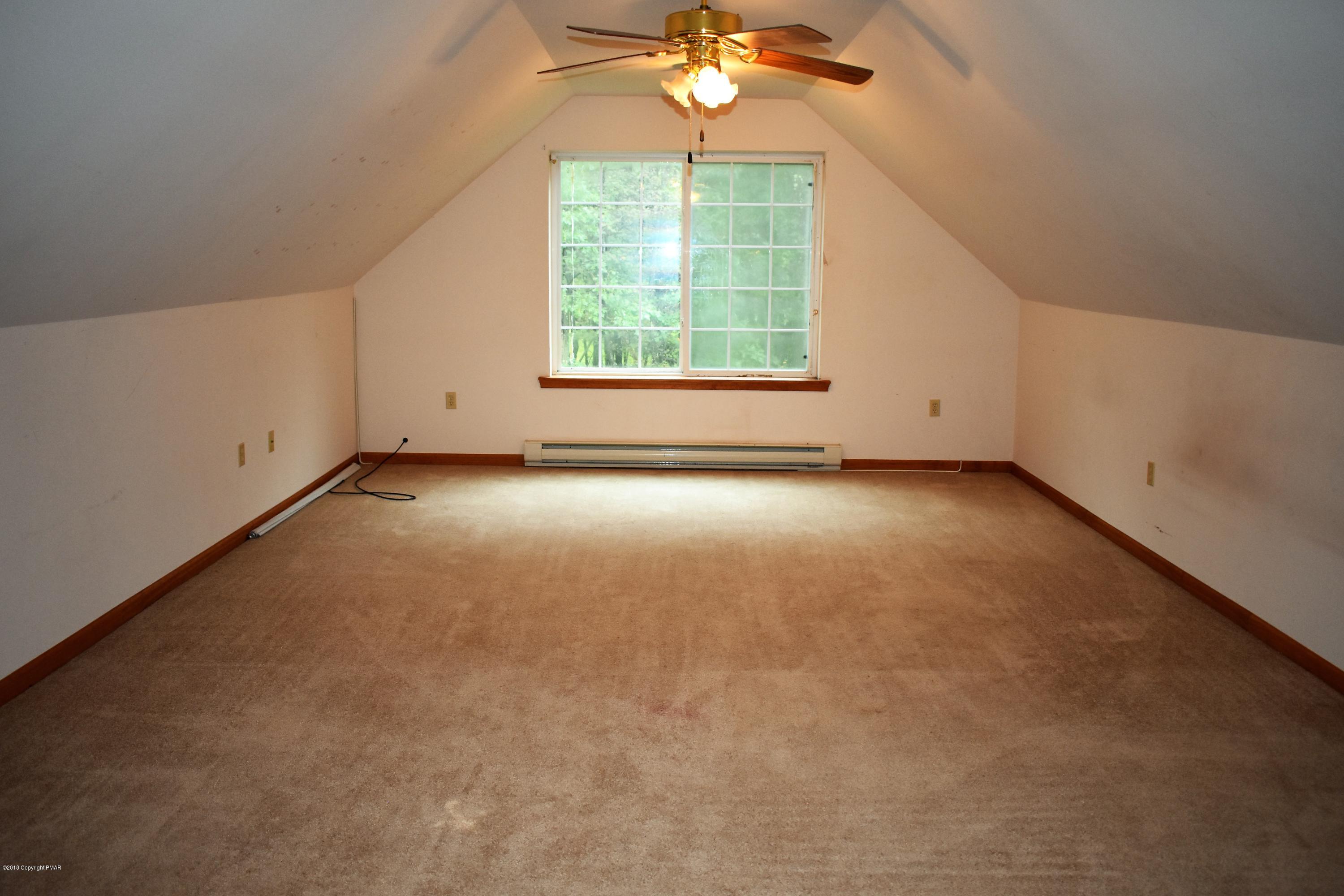 33 Sassafras Road Albrightsville, PA 18210 - Photo 14 of 36 an empty room with a window