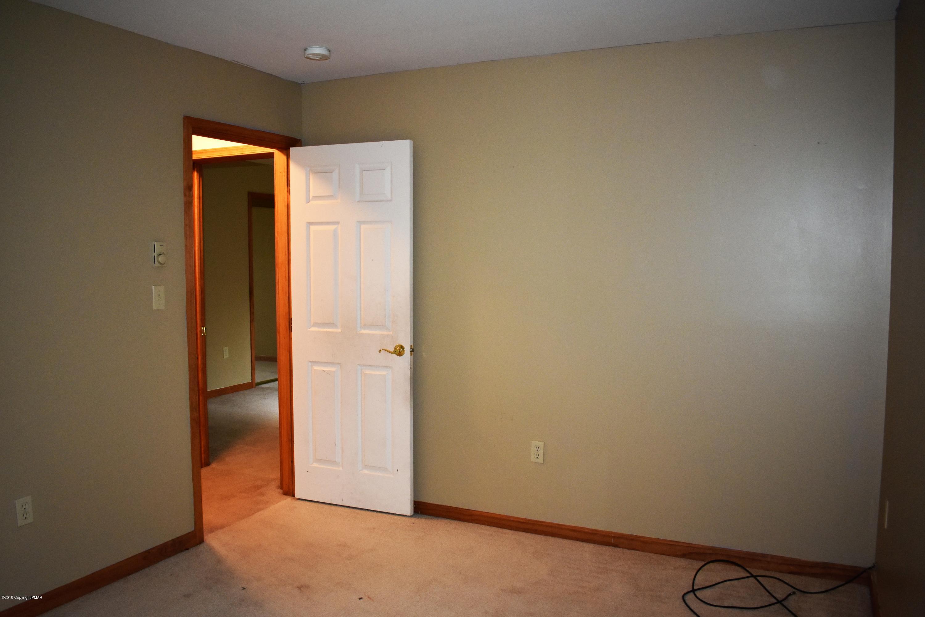 33 Sassafras Road Albrightsville, PA 18210 - Photo 28 of 36 an empty room with windows