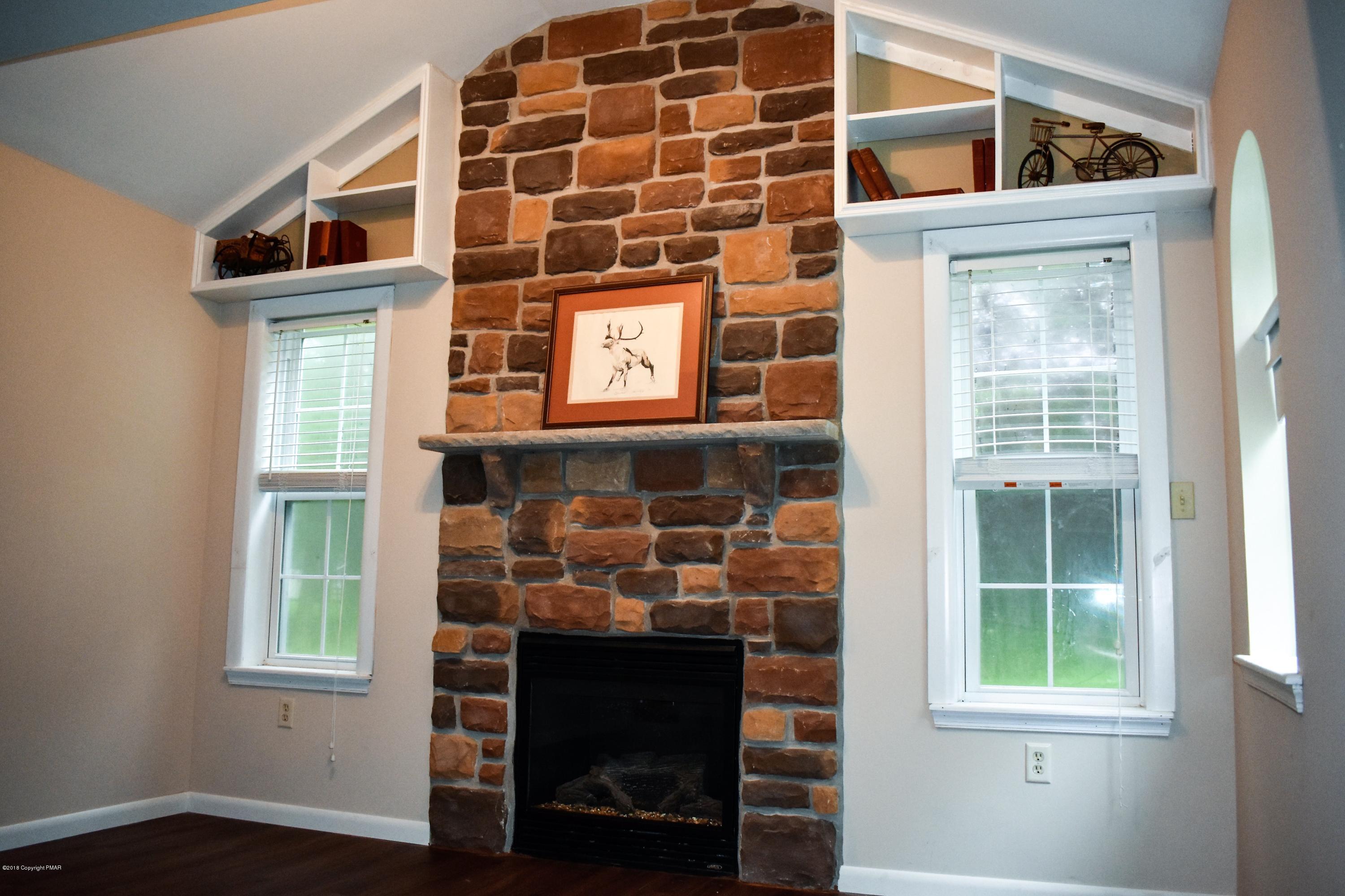 33 Sassafras Road Albrightsville, PA 18210 - Photo 5 of 36 a view of front door and wooden floor