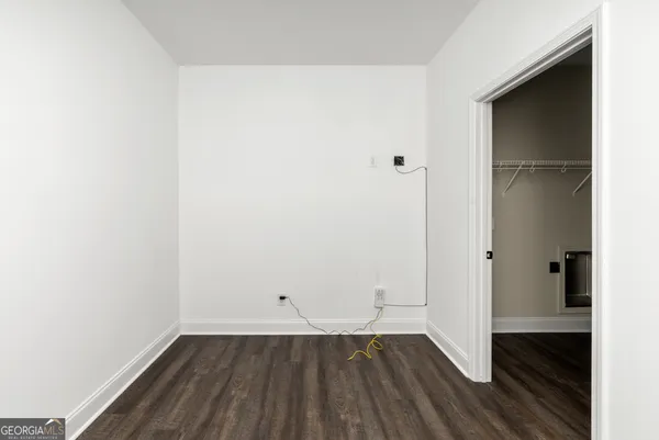 a bathroom with a toilet and a sink