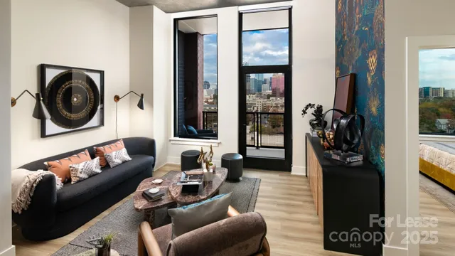 a living room with furniture and a window