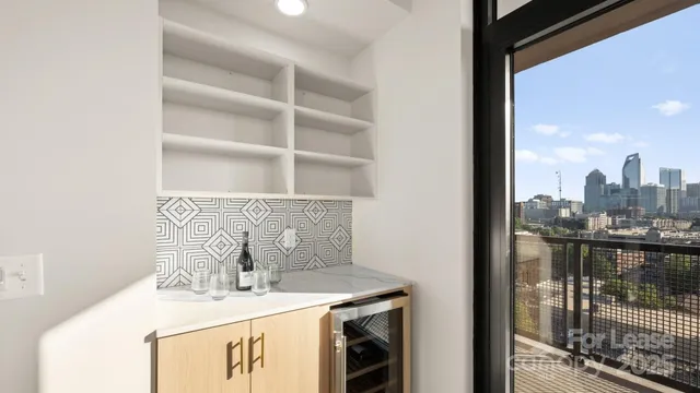 a room with a sink and cabinets