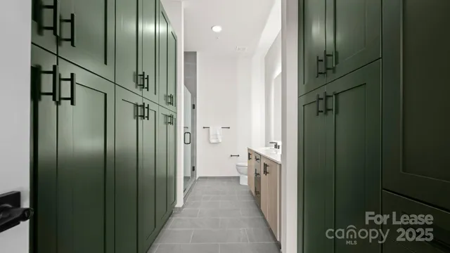 a view of a bathroom from the hallway