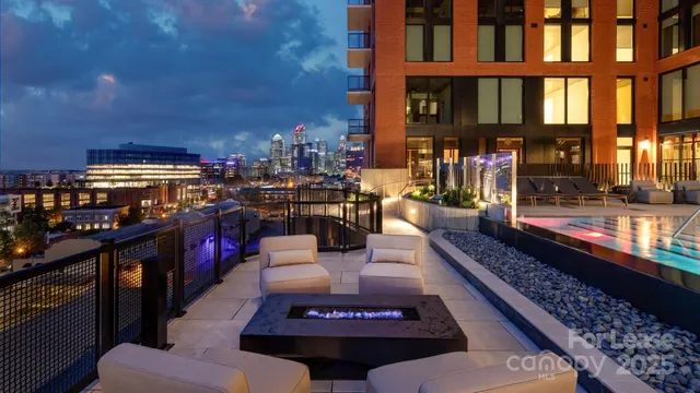 a outdoor space with lots of tables and chairs