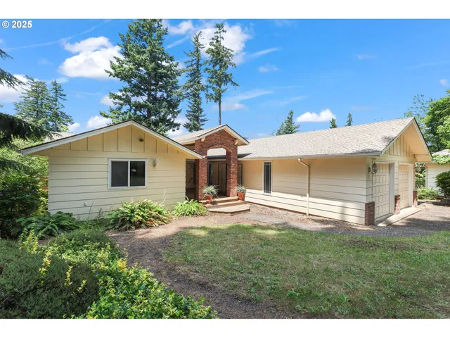 a house view with a garden space