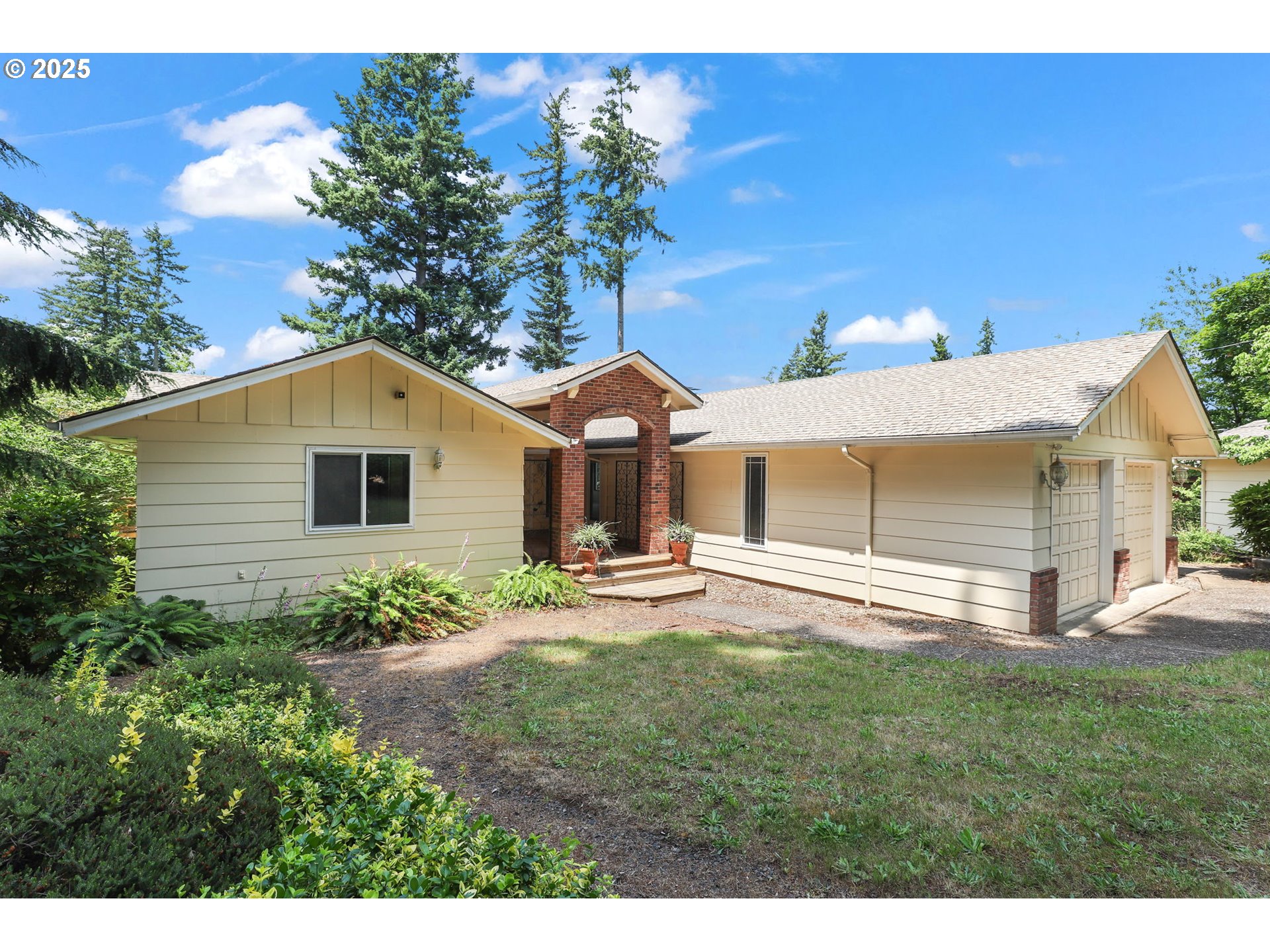 a house view with a garden space