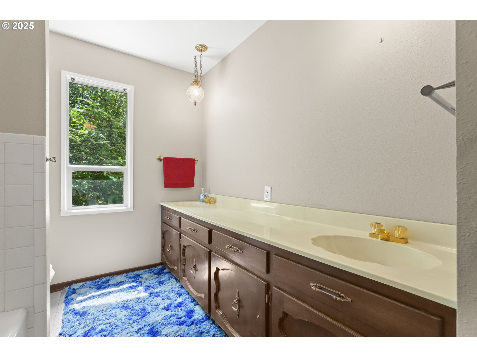 17501 Southeast Fosberg Road Boring, OR 97009 - Photo 14 of 48 a bathroom with a sink and a mirror