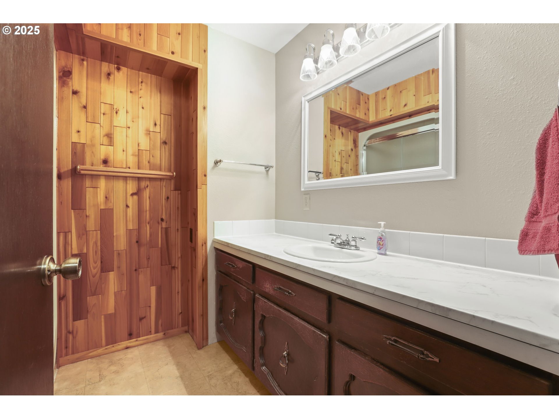 17501 Southeast Fosberg Road Boring, OR 97009 - Photo 17 of 48 a bathroom with a sink a mirror and a shower