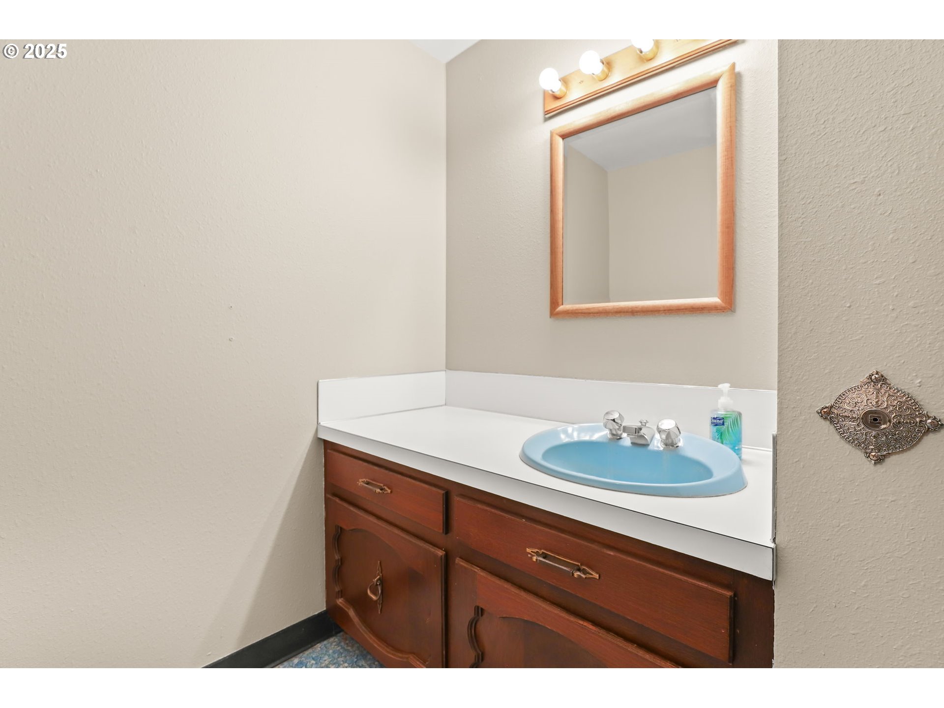 17501 Southeast Fosberg Road Boring, OR 97009 - Photo 22 of 48 a bathroom with a sink and a mirror
