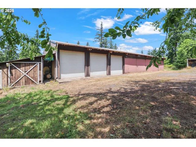 a backyard of a house with lots of green space