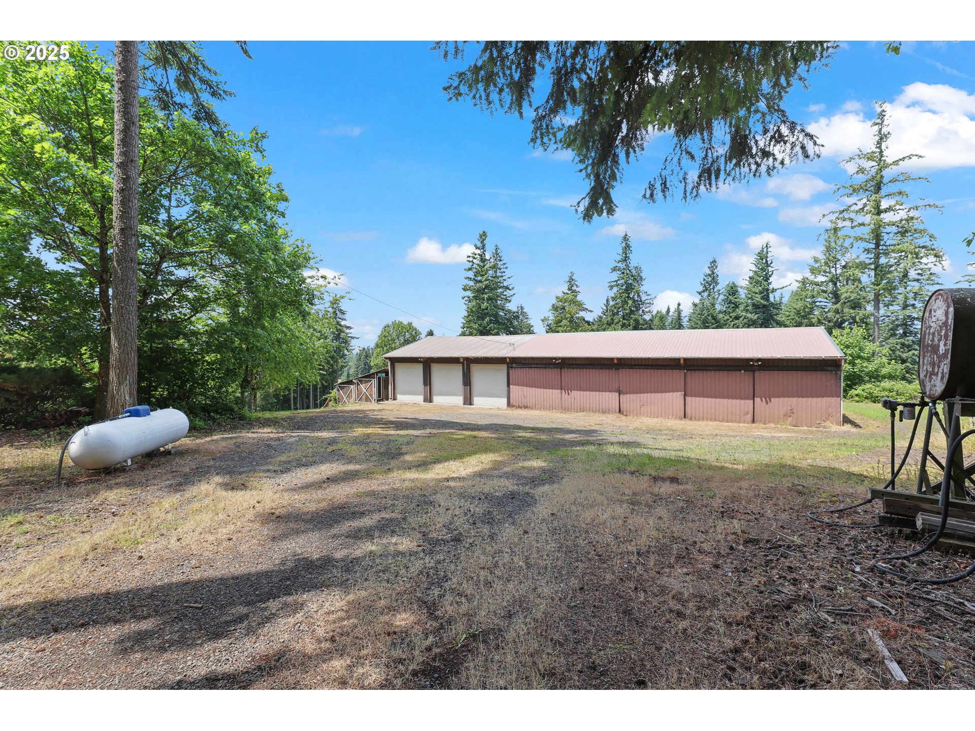 17501 Southeast Fosberg Road Boring, OR 97009 - Photo 32 of 48 a view of a backyard with a tree