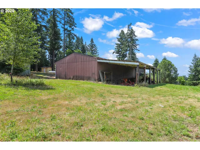 a backyard of a house with lots of green space