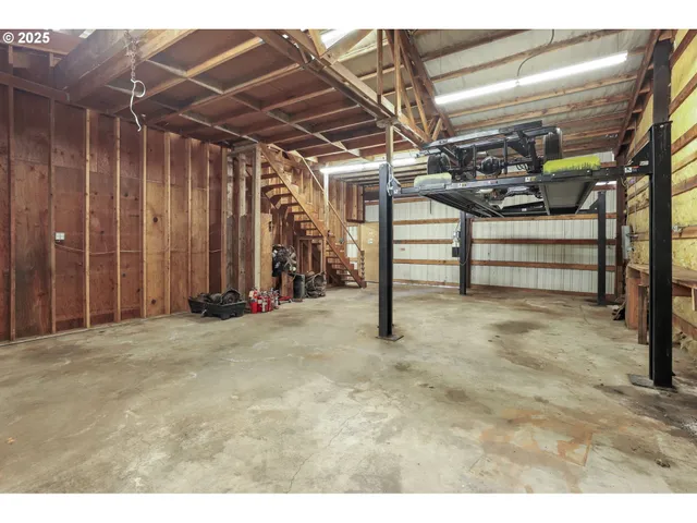 a view of an empty room with stairs