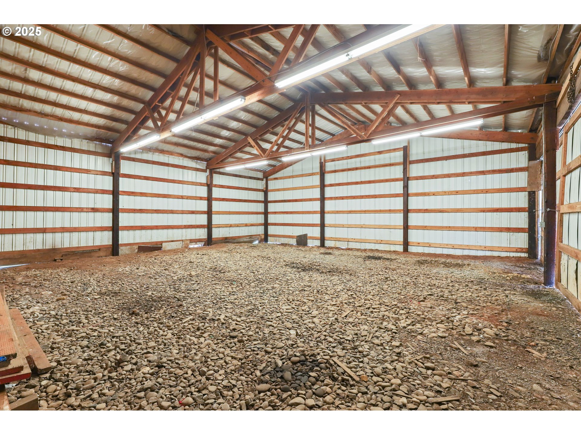 17501 Southeast Fosberg Road Boring, OR 97009 - Photo 38 of 48 a view of a room with a wooden floor
