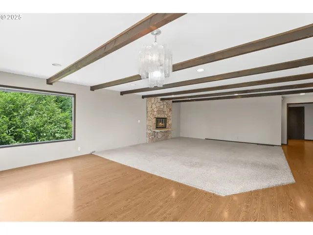 a view of empty room with windows