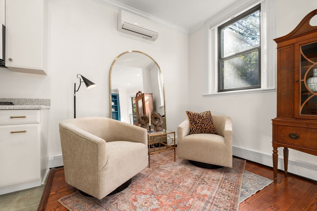 457 Beacon Street, Unit 5 Boston, MA 02115 - Photo 11 of 22 a living room with furniture and a window