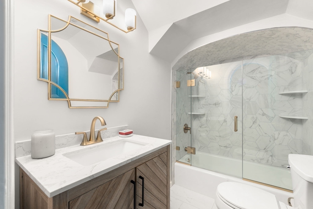 457 Beacon Street, Unit 5 Boston, MA 02115 - Photo 13 of 22 a bathroom with a sink toilet and shower