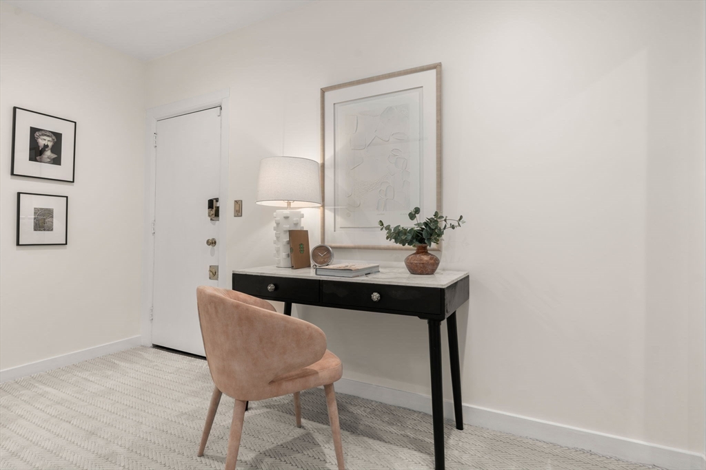 457 Beacon Street, Unit 5 Boston, MA 02115 - Photo 17 of 22 a view of a room with a table and chairs