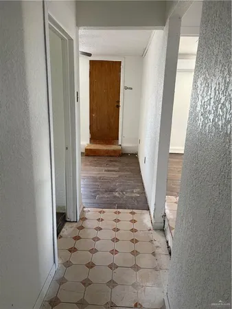 a view of a door in the hallway