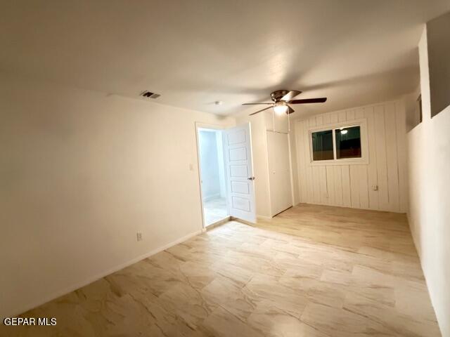 305 Edith Drive El Paso, TX 79915 - Photo 12 of 25 a view of a livingroom with a ceiling fan and window