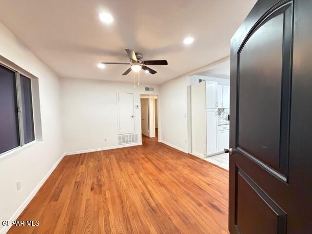 305 Edith Drive El Paso, TX 79915 - Photo 5 of 25 a view of empty room with wooden floor and fan
