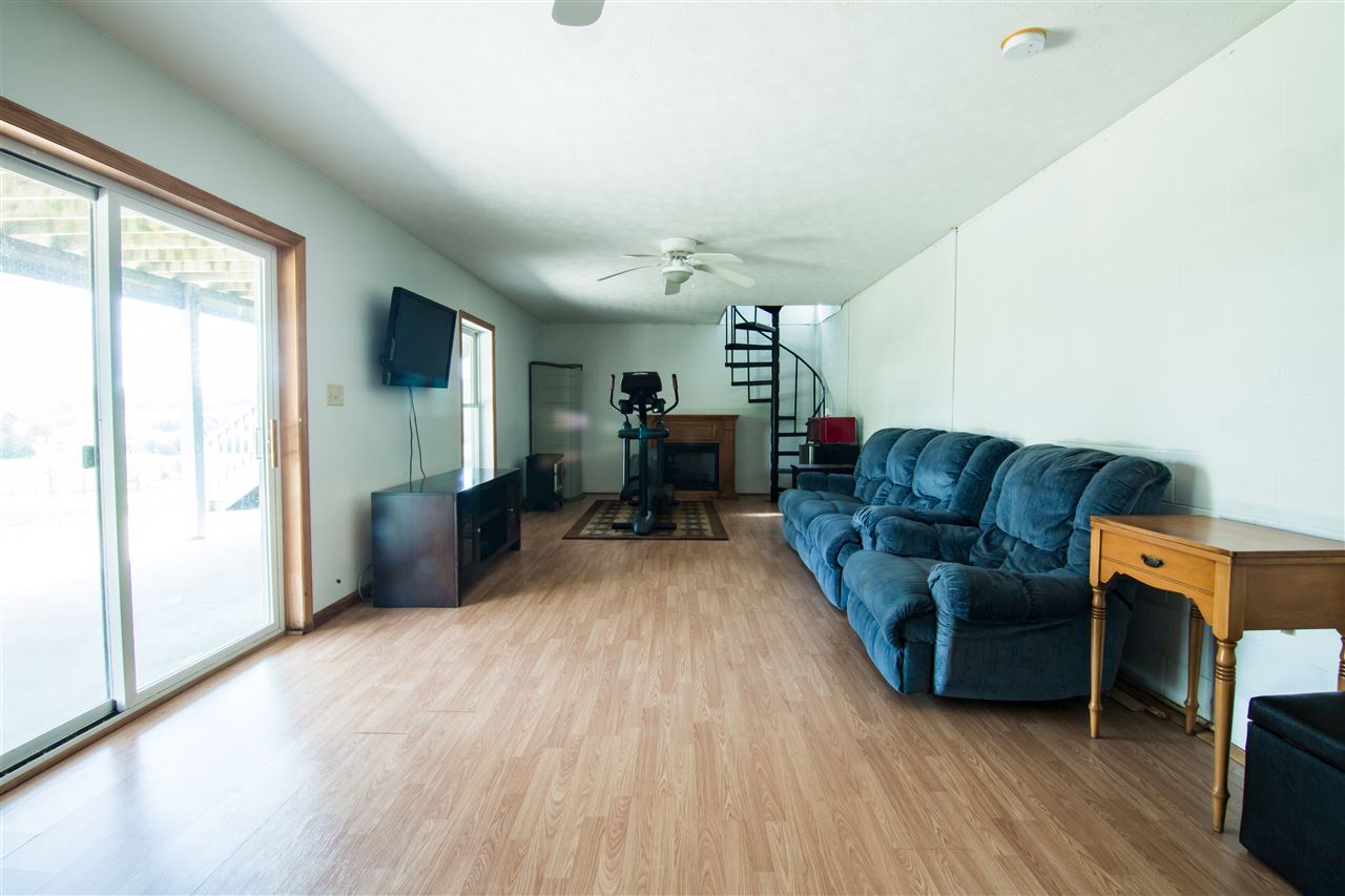 9478 Waggys Creek Road Dayton, VA 22821 - Photo 36 of 36 a living room with furniture and a wooden floor