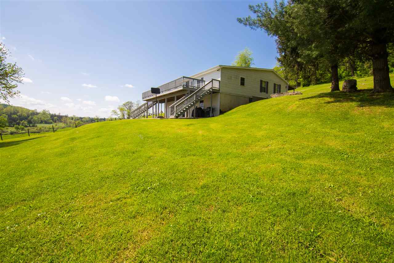 9478 Waggys Creek Road Dayton, VA 22821 - Photo 4 of 36 a yellow house with pool in front of it