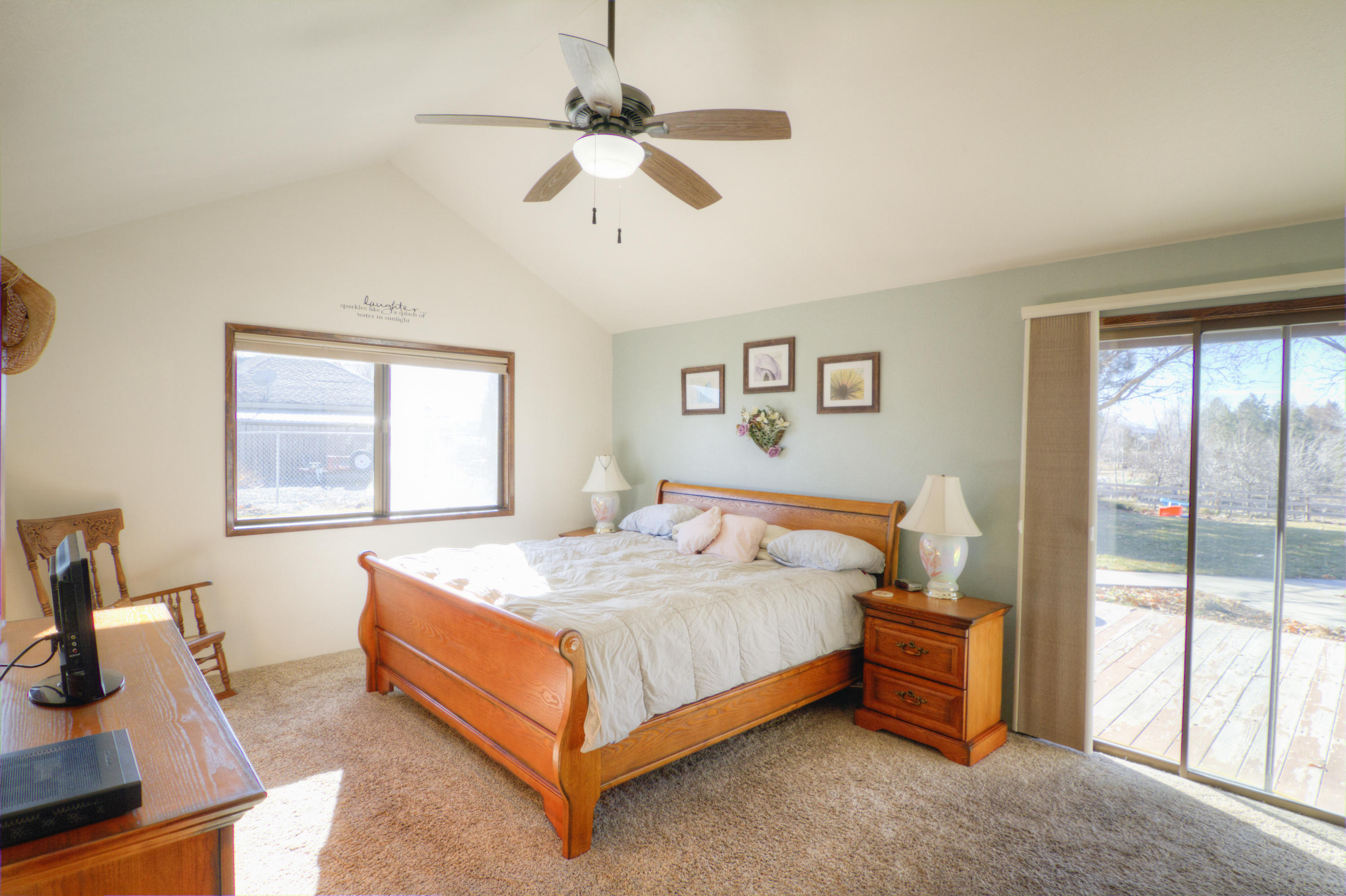 6518 Reeder Road Klamath Falls, OR 97603 - Photo 16 of 25 a bedroom with a bed and a window