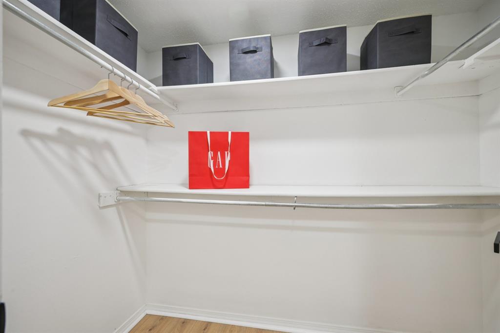 18333 Roehampton Drive, Unit 128 Dallas, TX 75252 - Photo 14 of 40 a close up view of shower