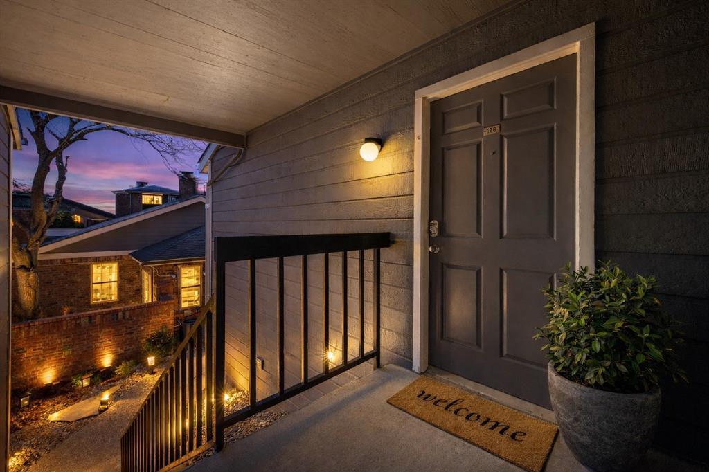 18333 Roehampton Drive, Unit 128 Dallas, TX 75252 - Photo 19 of 40 a view of a entryway door of the house