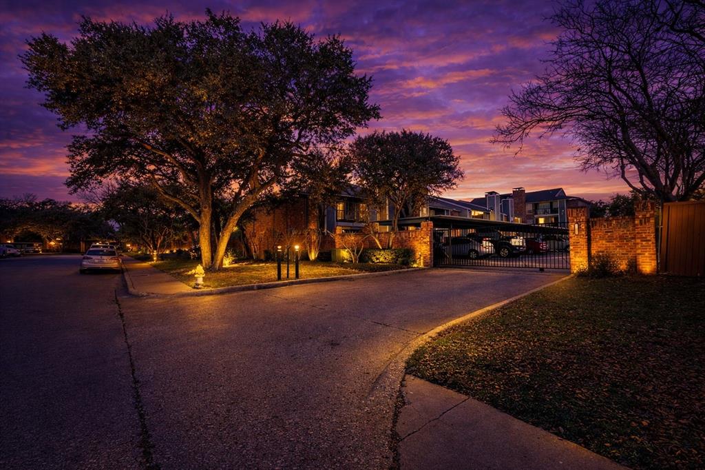 18333 Roehampton Drive, Unit 128 Dallas, TX 75252 - Photo 32 of 40 a view of street with trees
