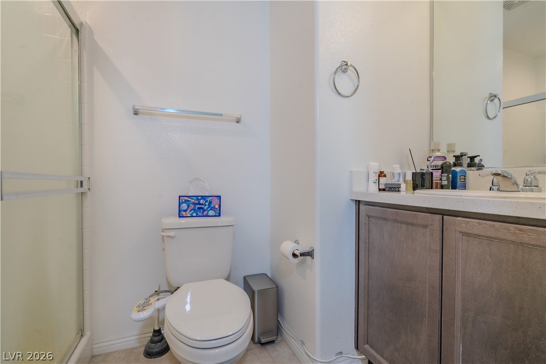 1239 Raritan Place Henderson, NV 89002 - Photo 13 of 26 Full bathroom featuring a shower stall and vanity