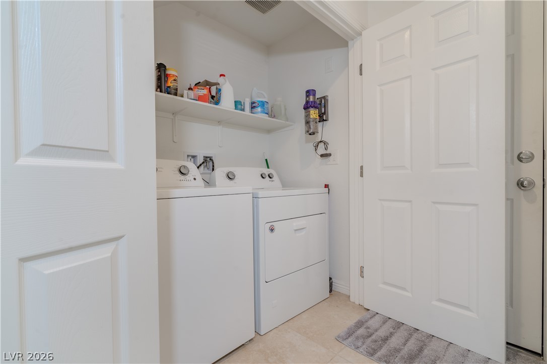 1239 Raritan Place Henderson, NV 89002 - Photo 14 of 26 Laundry area with washing machine and clothes dryer