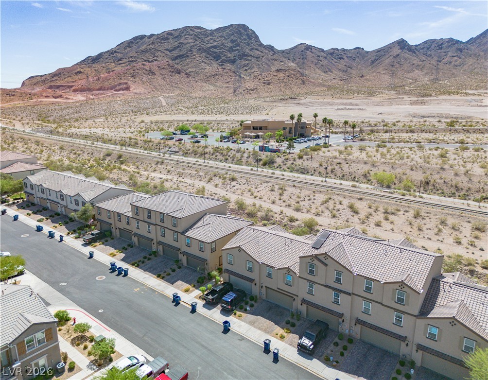 1239 Raritan Place Henderson, NV 89002 - Photo 19 of 26 Overview landscape with nearby suburban area and a mountain backdrop