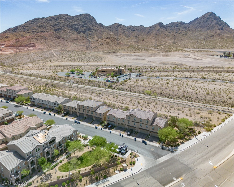 1239 Raritan Place Henderson, NV 89002 - Photo 22 of 26 Aerial perspective of suburban area with a mountain backdrop