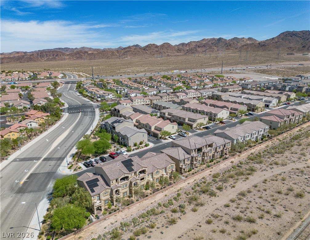 1239 Raritan Place Henderson, NV 89002 - Photo 23 of 26 Aerial view of residential area featuring mountains