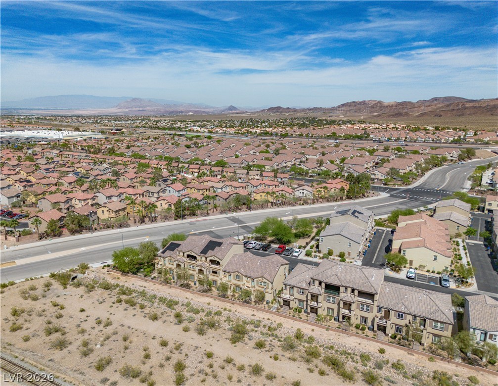 1239 Raritan Place Henderson, NV 89002 - Photo 24 of 26 Aerial view of residential area featuring mountains