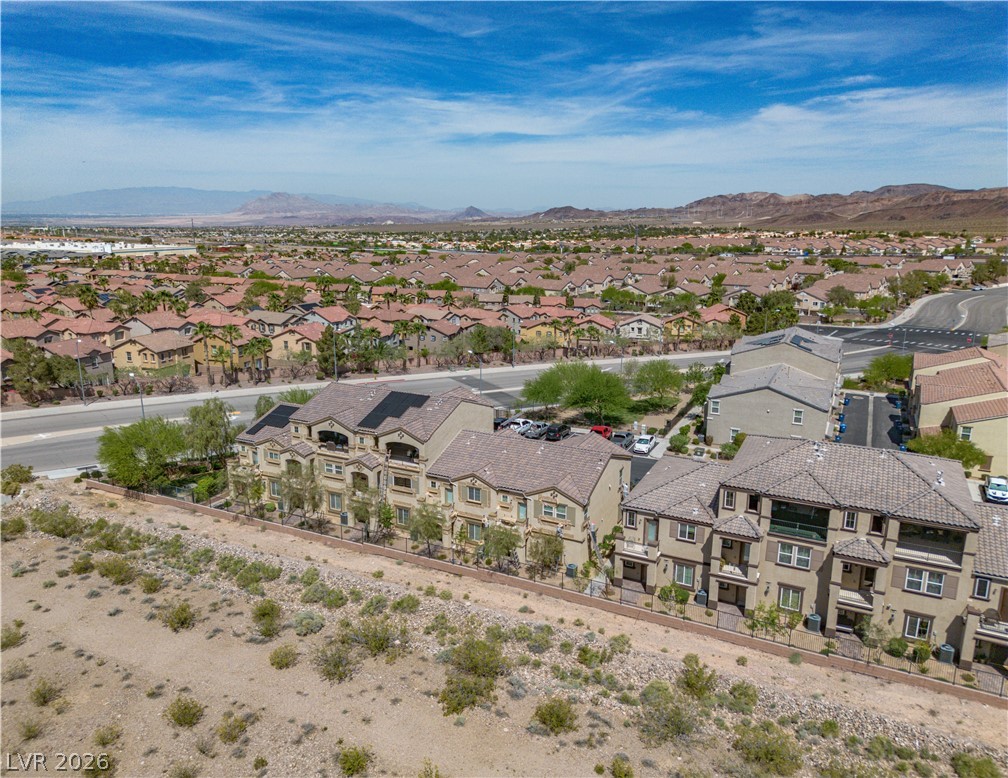 1239 Raritan Place Henderson, NV 89002 - Photo 25 of 26 Aerial view of residential area featuring a mountainous background