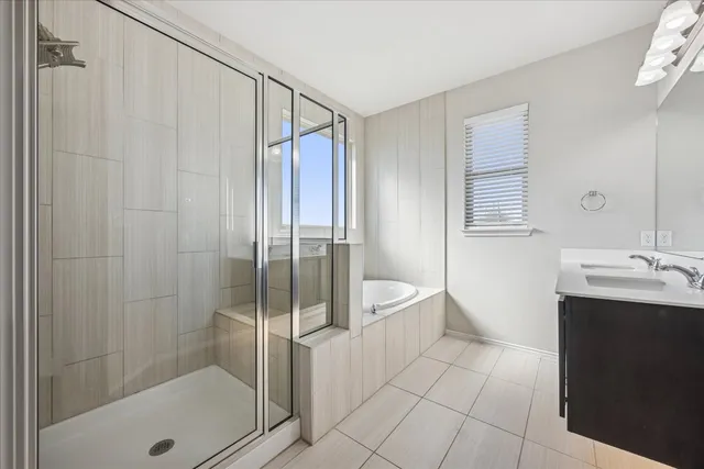 a bathroom with a shower a toilet and sink