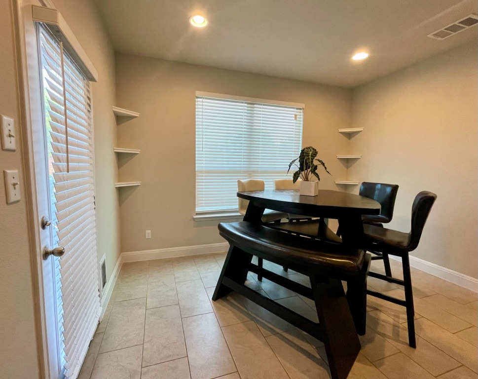 1036 Chad Loop Round Rock, TX 78665 - Photo 5 of 22 a view of a workspace with furniture and a window