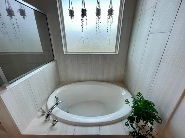 a bathroom with a bathtub